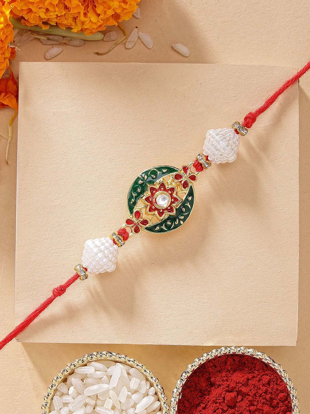 

KARATCART Floral Design Red & Green Meena Rakhi with Roli Chawal