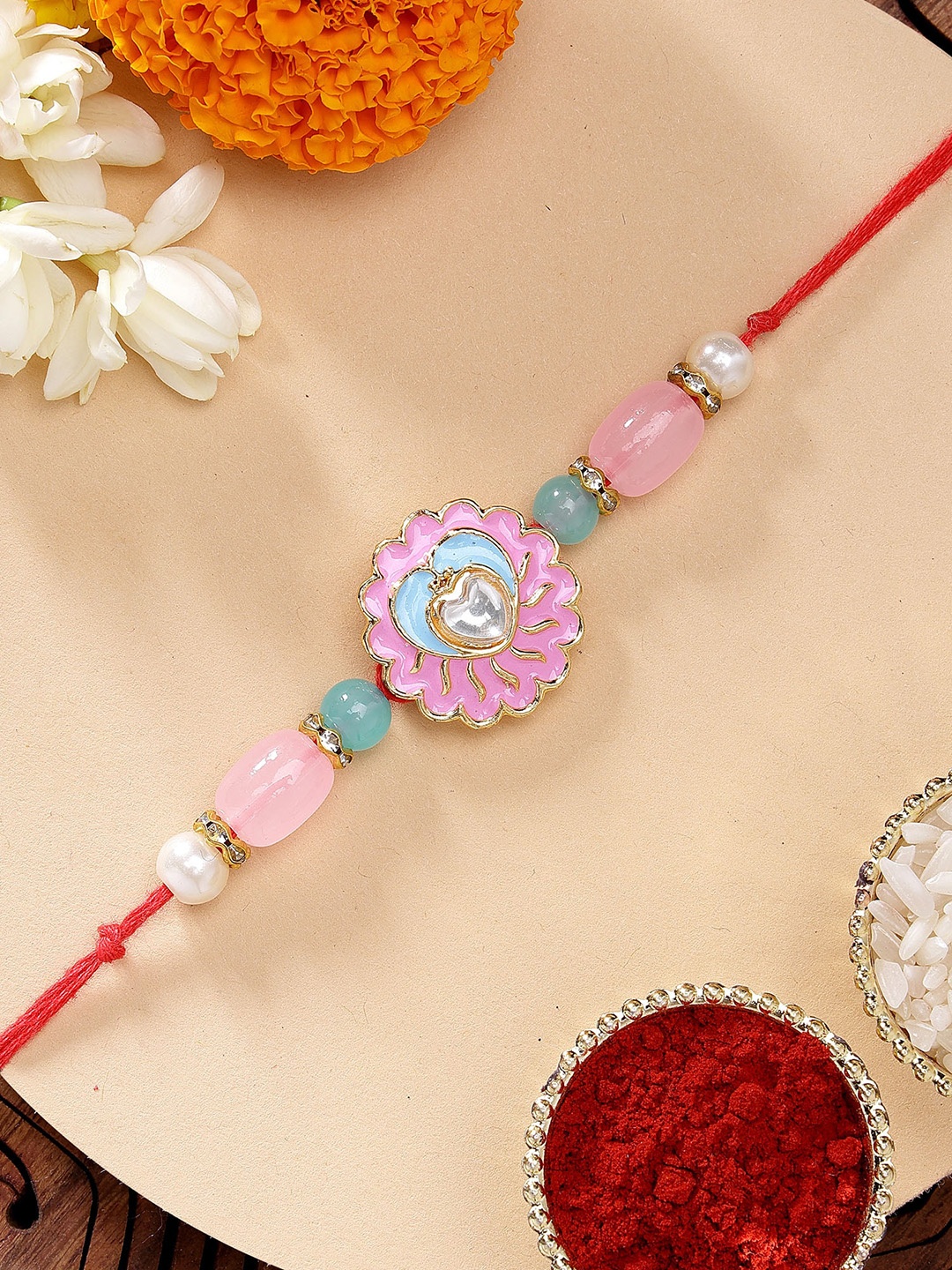 

KARATCART Pink & Blue Floral Meenakari Rakhi with Roli Chawal