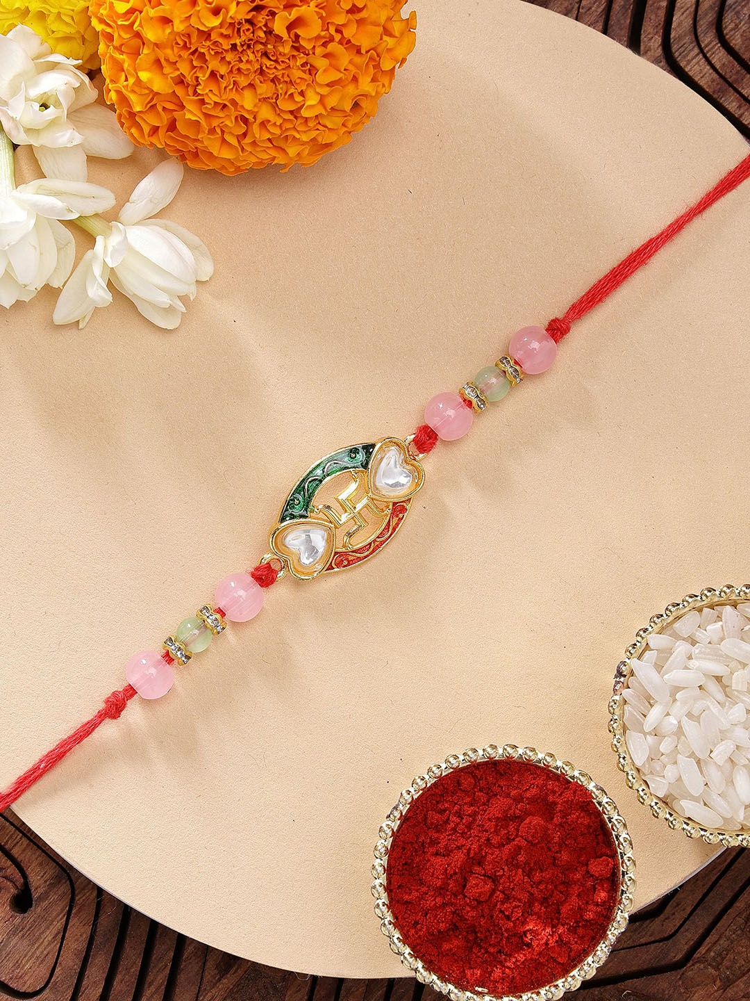 

KARATCART Swastika & Heart Design Rakhi with Roli & Chawal, Red