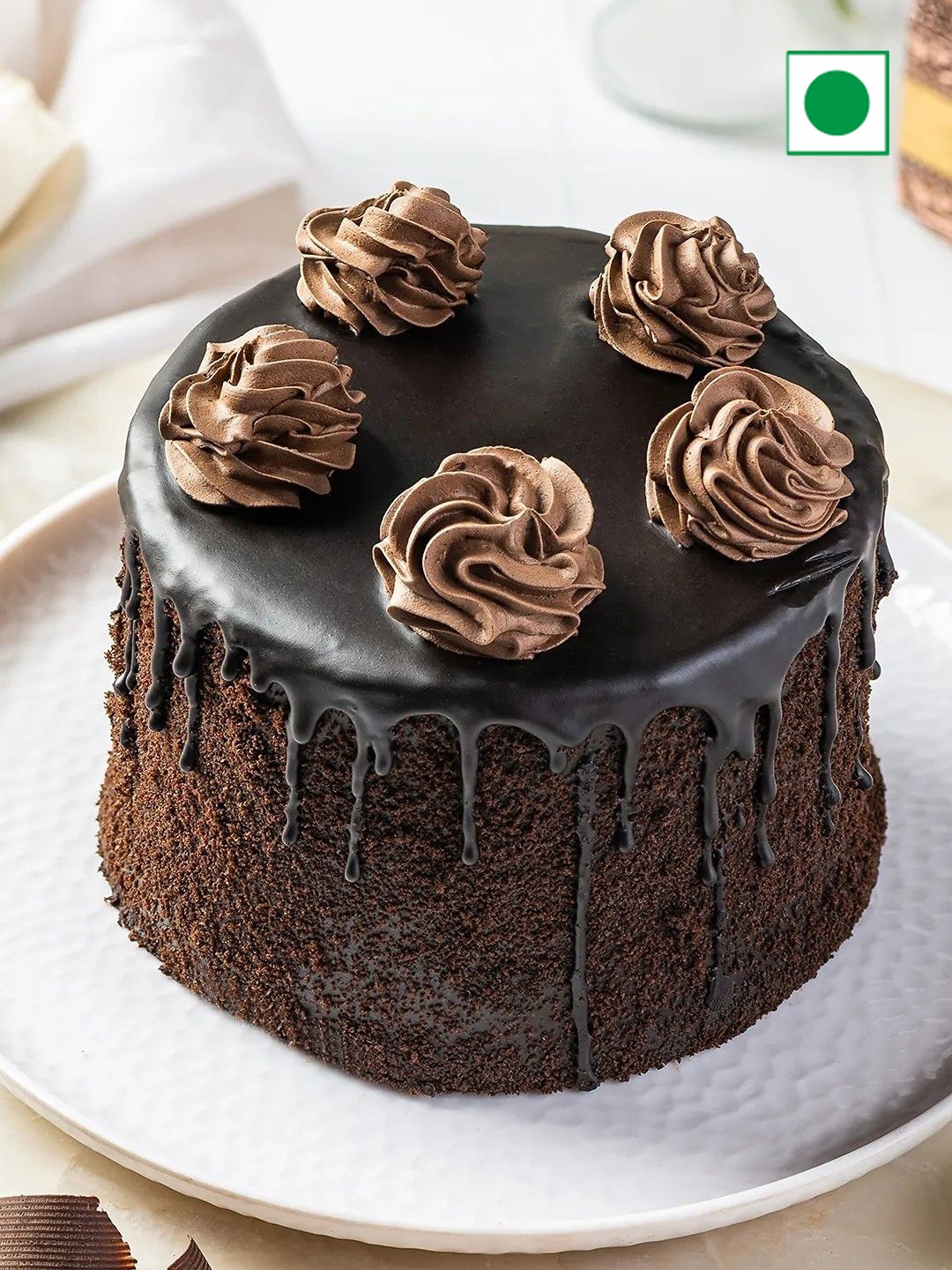 

fnp Truffle Flavour Eggless Round Cake -1Kg, Brown