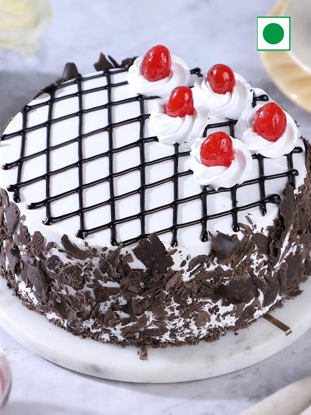 

fnp Rich And Velvety Black Forest Eggless Round Cake- 1Kg, Brown