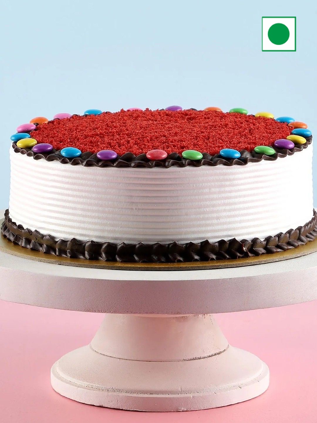 

fnp Red Velvet Flavour Eggless Gems Round Cake- 1kg