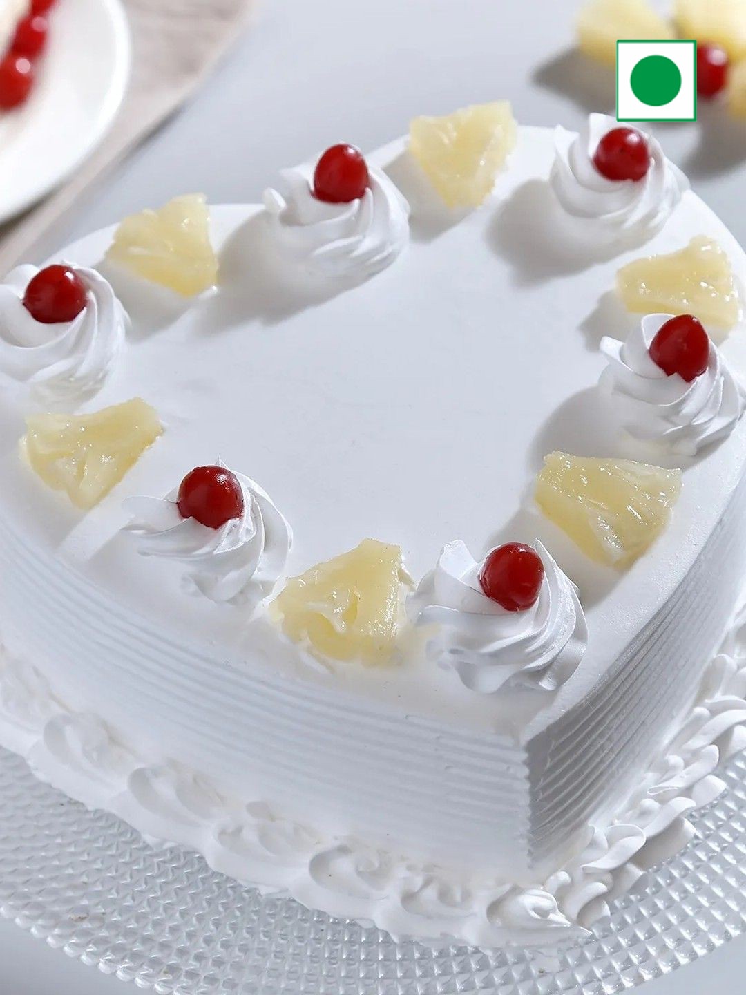 

fnp Pineapple Flavor Eggless Heart Cake - 1Kg, Yellow