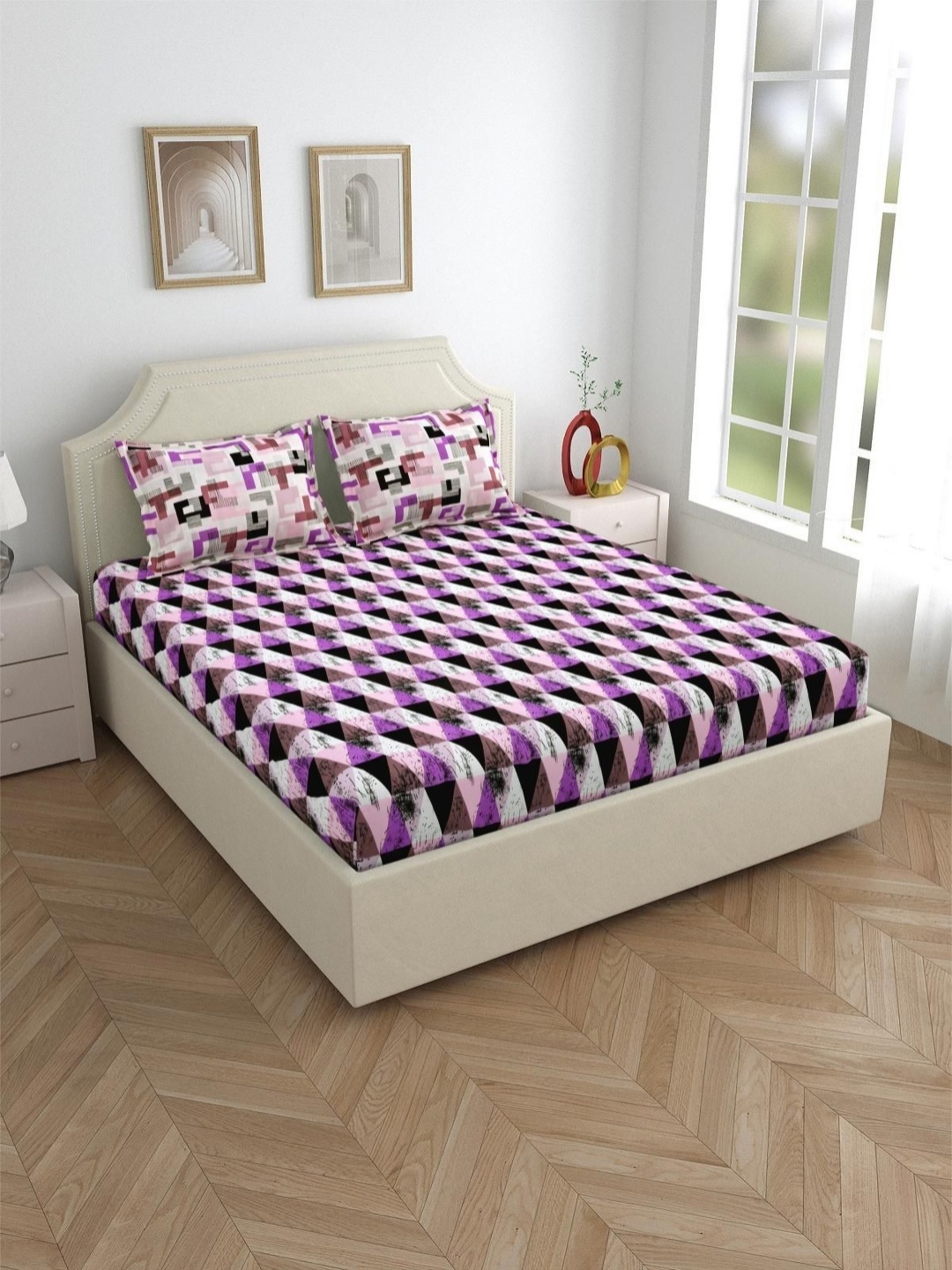 

Salona Bichona Purple & White Geometric 120 TC Queen Bedsheet with 2 Pillow Covers