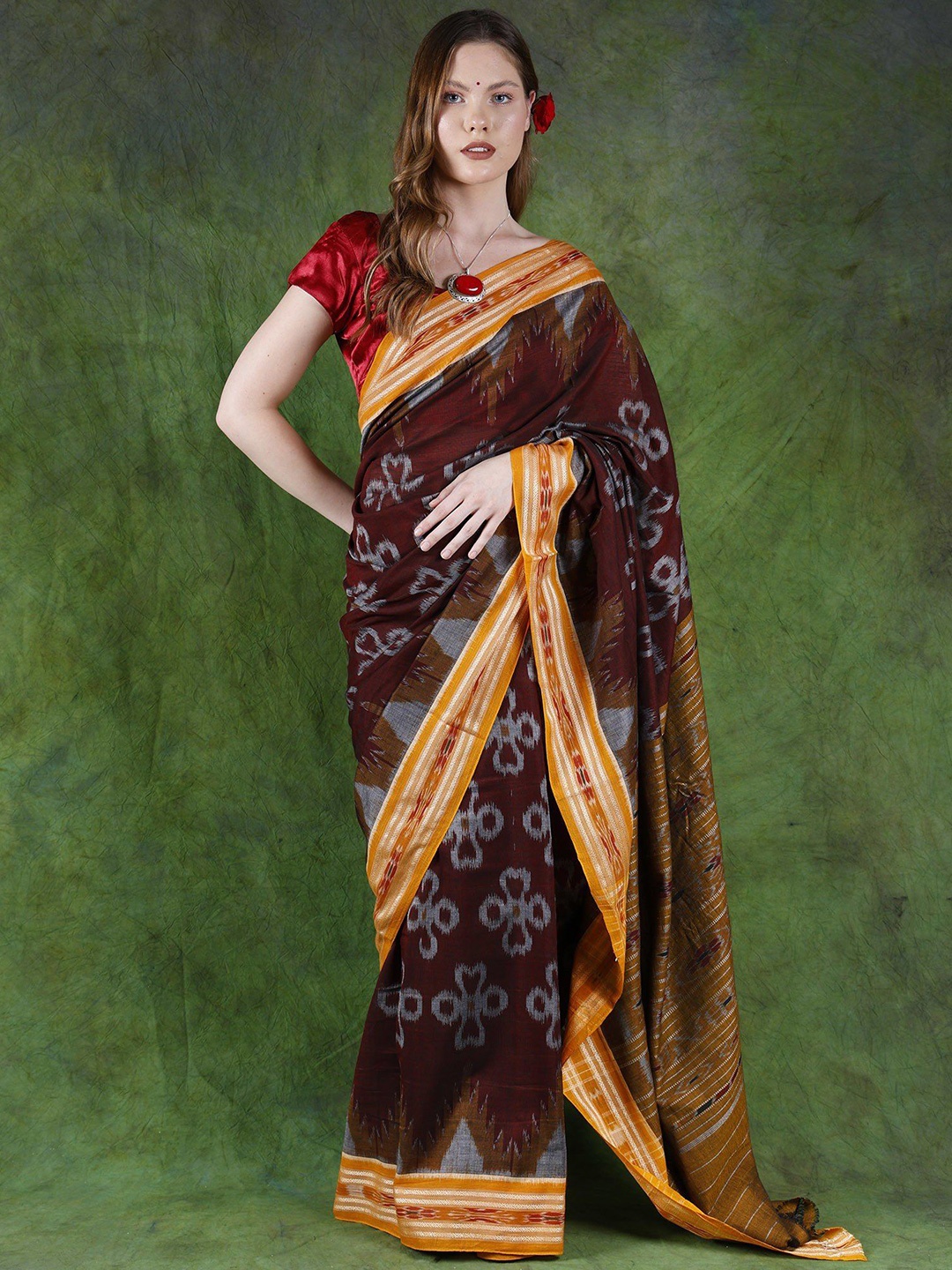 

Exotic India New Maroon Sambalpuri Saree with Ikat Woven All Over & Temple Border
