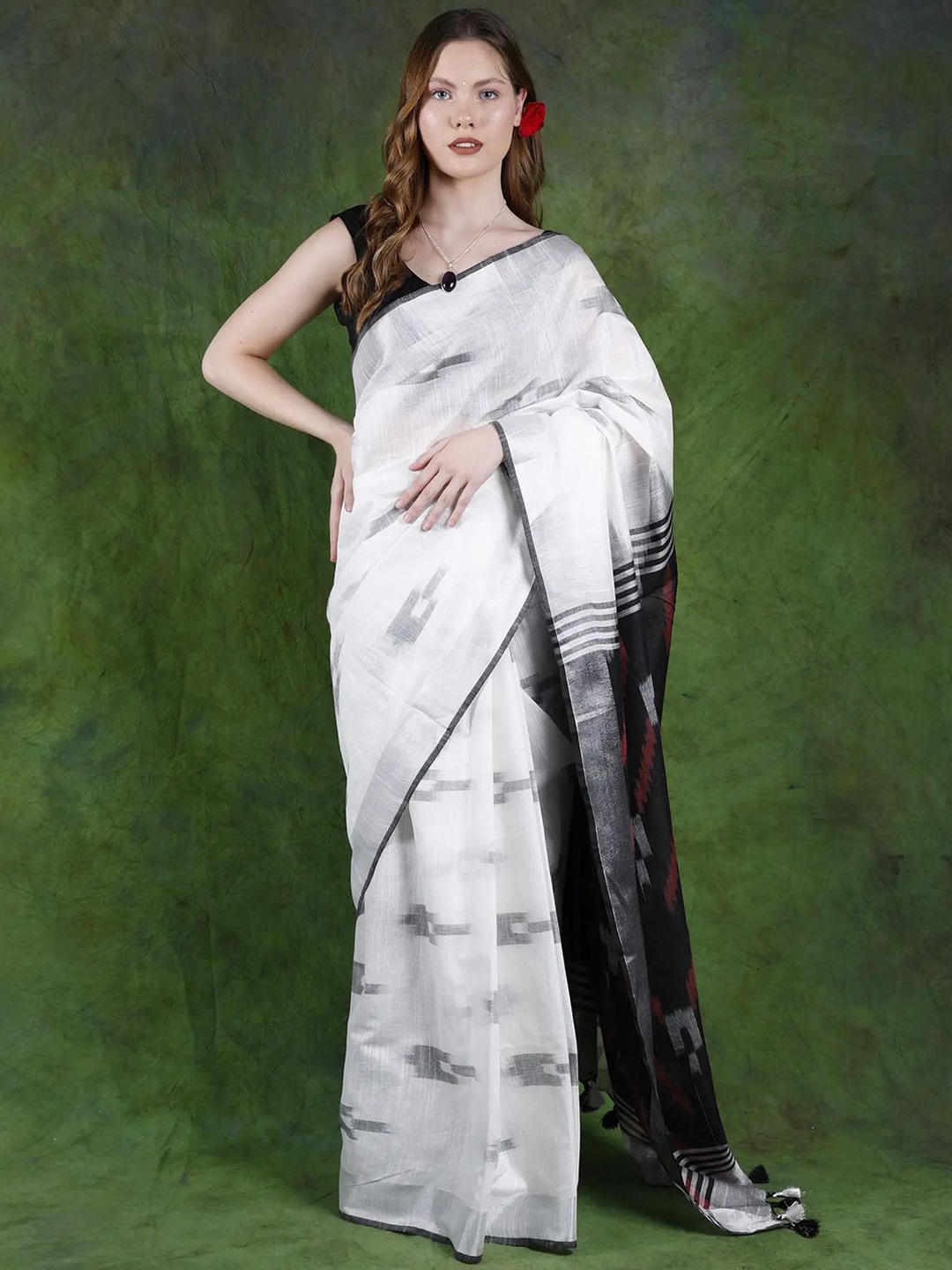 

Exotic India Woven Design Zari Pure Cotton Ikat Saree, White