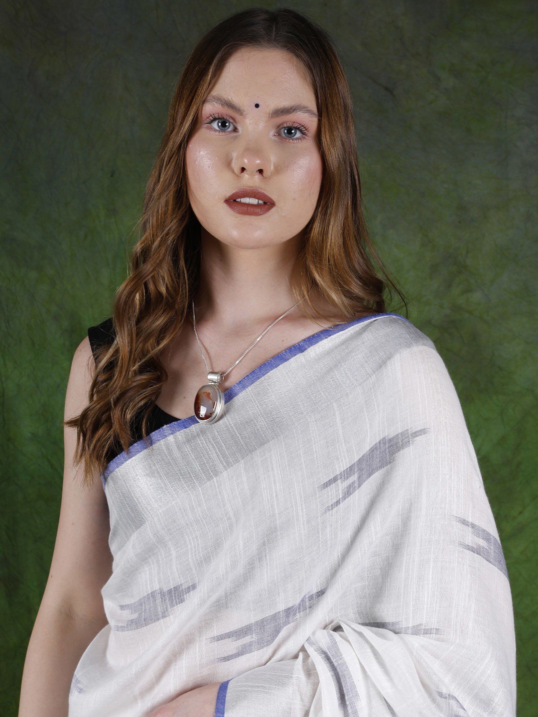 

Exotic India Woven Design Zari Pure Cotton Ikat Saree, White