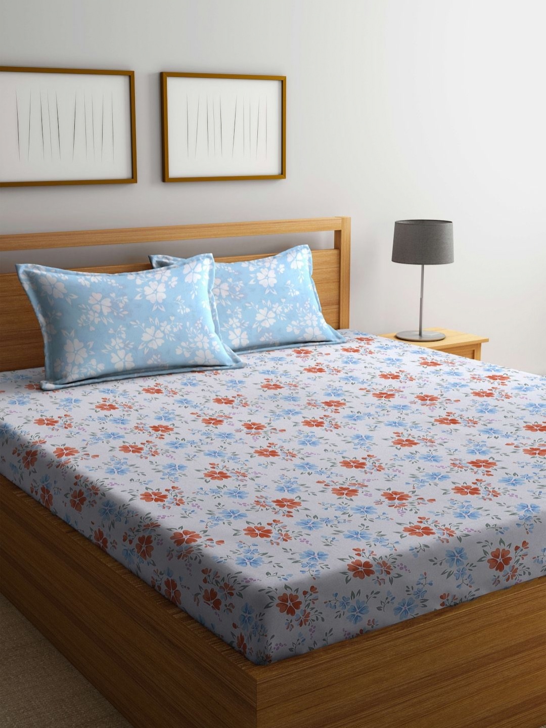 

BOMBAY DYEING Blue & White Floral 104 TC Cotton Queen Bedsheet with 2 Pillow Covers