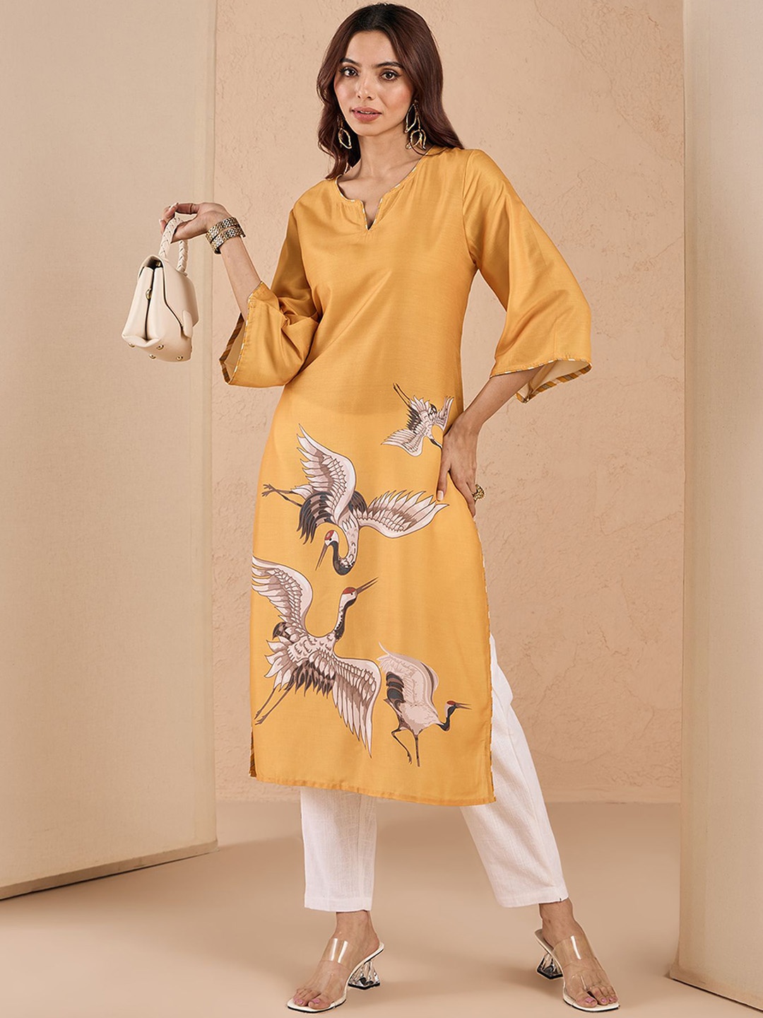 

Likha Round Neck Ethnic Motifs Embroidered Straight Kurta, Mustard