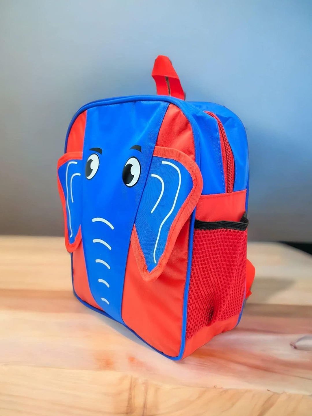 

ANNA CREATIONS Unisex Kids Colourblocked Backpack with Hip Strap, Blue