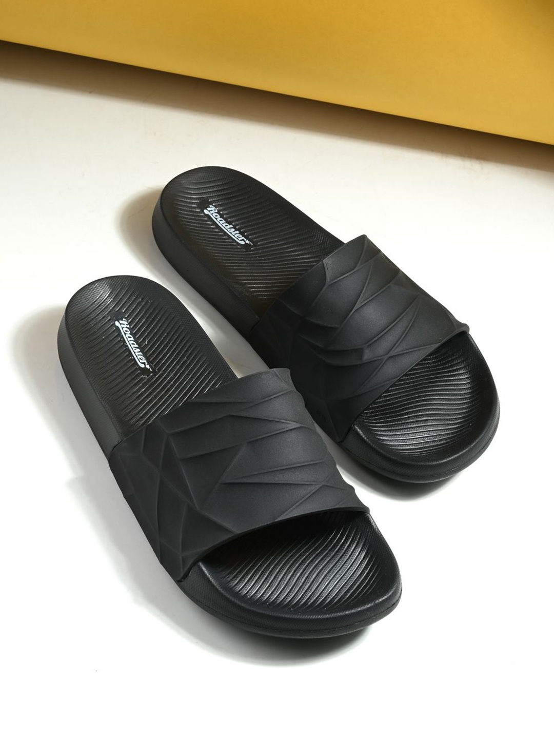 

The Roadster Lifestyle Co. Men Black Textured Sliders