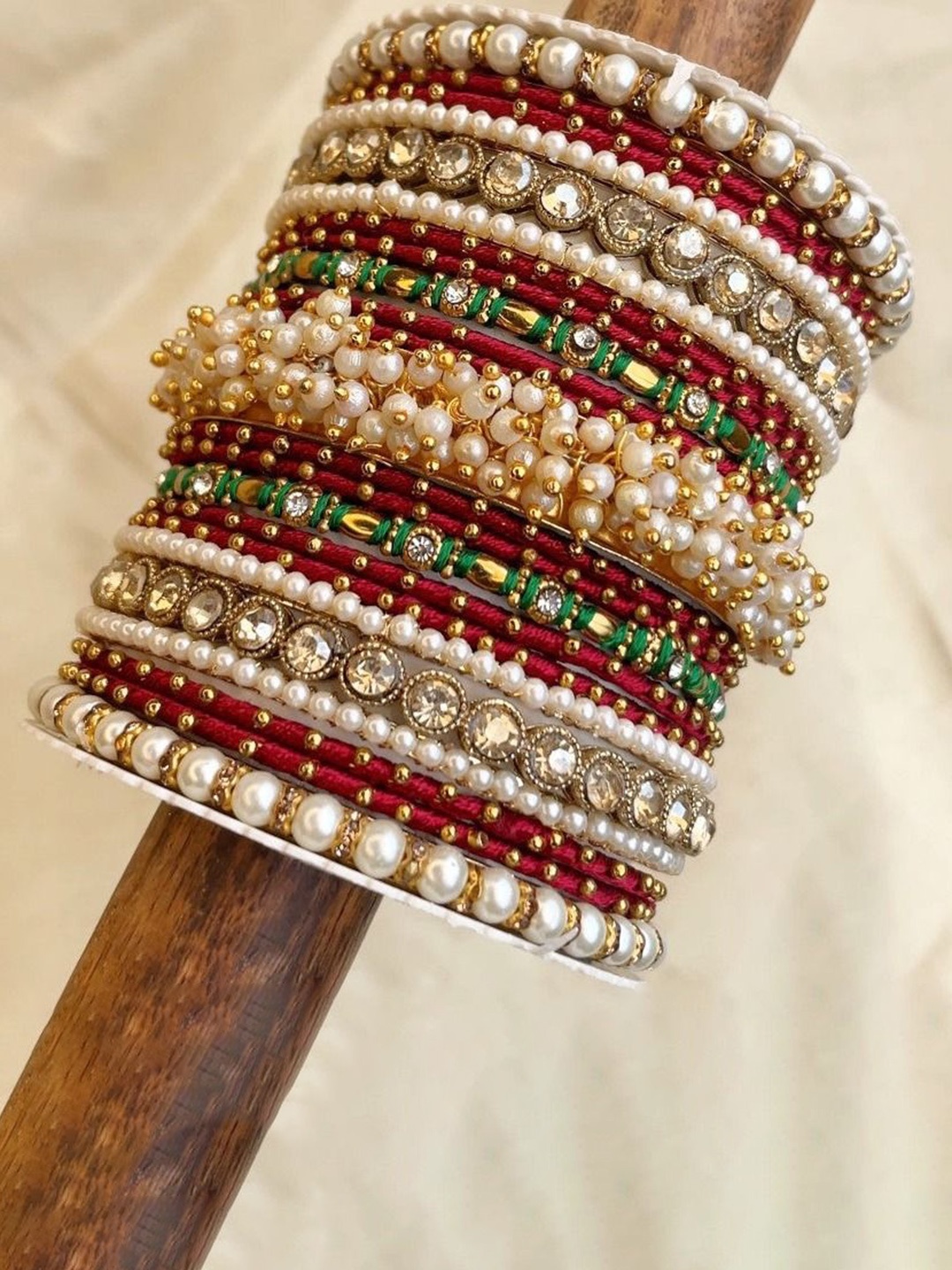 

leshya Set Of 46 Brass-Plated Kundan Studded Bangles, Red