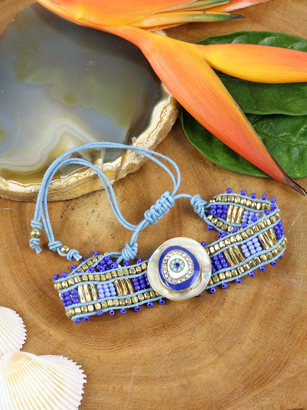

Asthetika Evil Eye Beaded Bracelet Rakhi with Roli Chawal, Blue