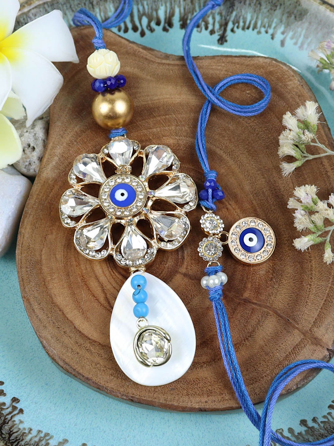 

Asthetika Evil Eye Stone Studded Bhaiya Bhabhi Rakhis with Roli Chawal, Blue
