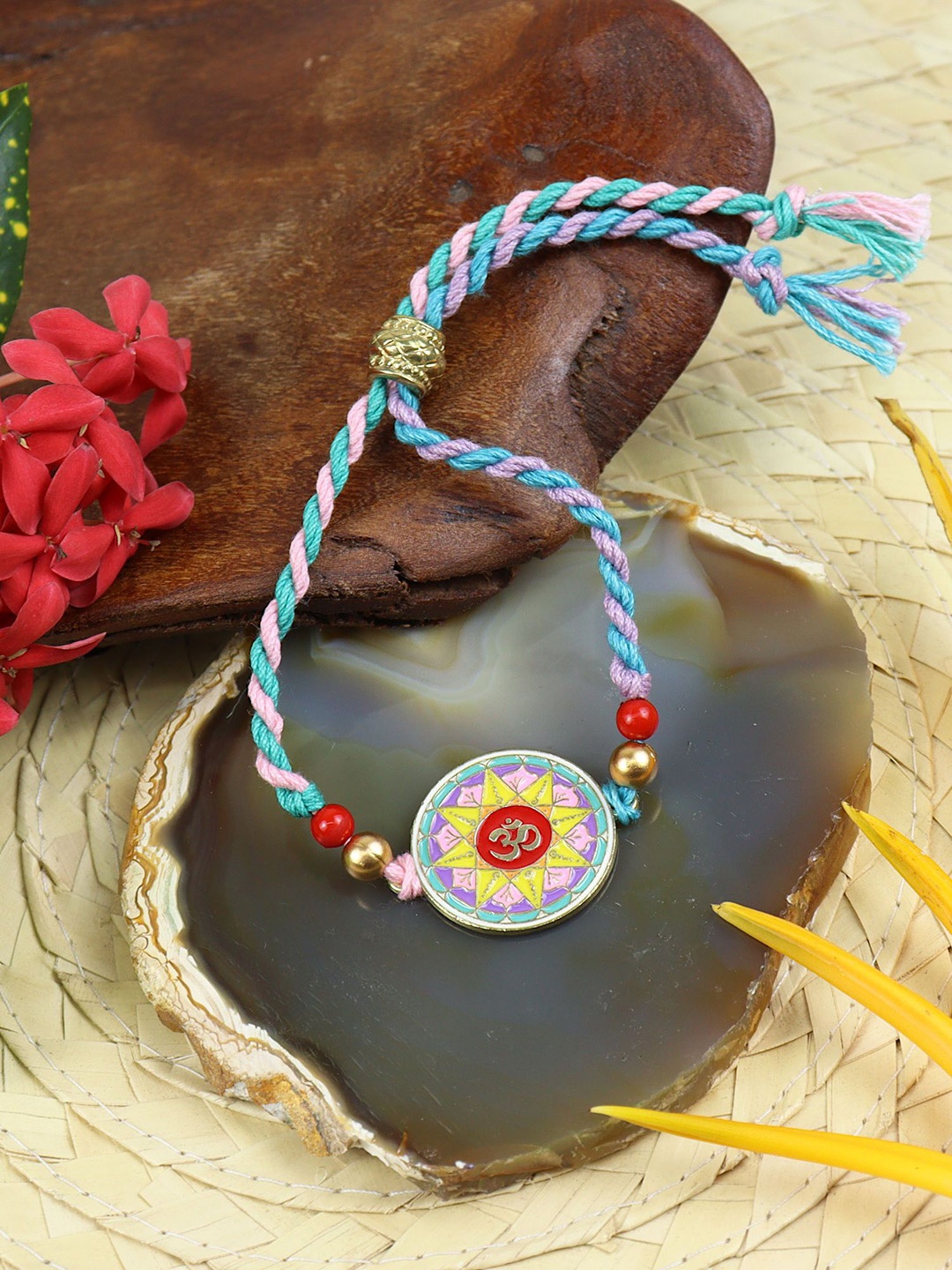 

Asthetika OM Meena Stone Studded Bracelet Rakhi with Roli Chawal, Blue