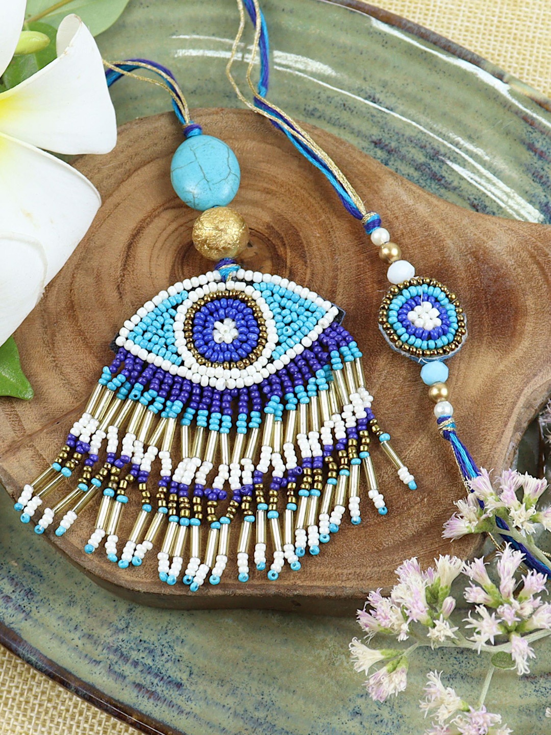 

Asthetika Set Of 2 Evil Eye Beaded Strands Bhaiya Bhabhi Rakhi Pair with Roli Chawal, Blue