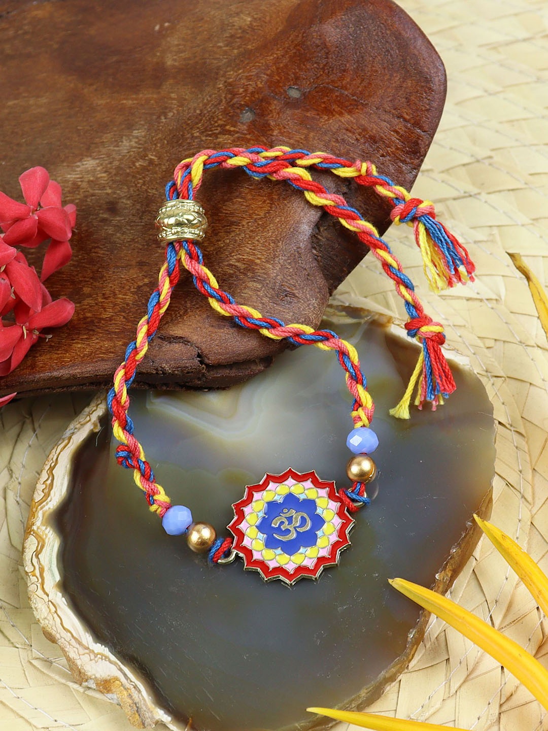 

Asthetika OM Meena Stone Studded Bracelet Rakhi with Roli Chawal, Red