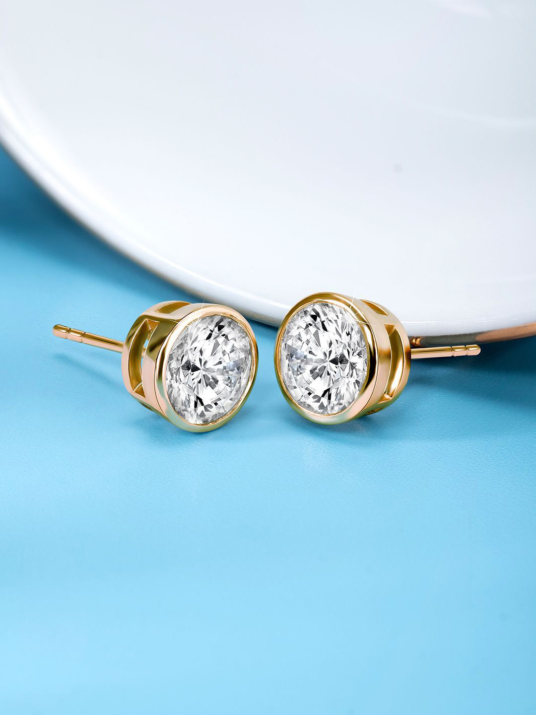 

Peora Gold-Plated Brass Cubic Zirconia Contemporary Shaped Studs Earrings