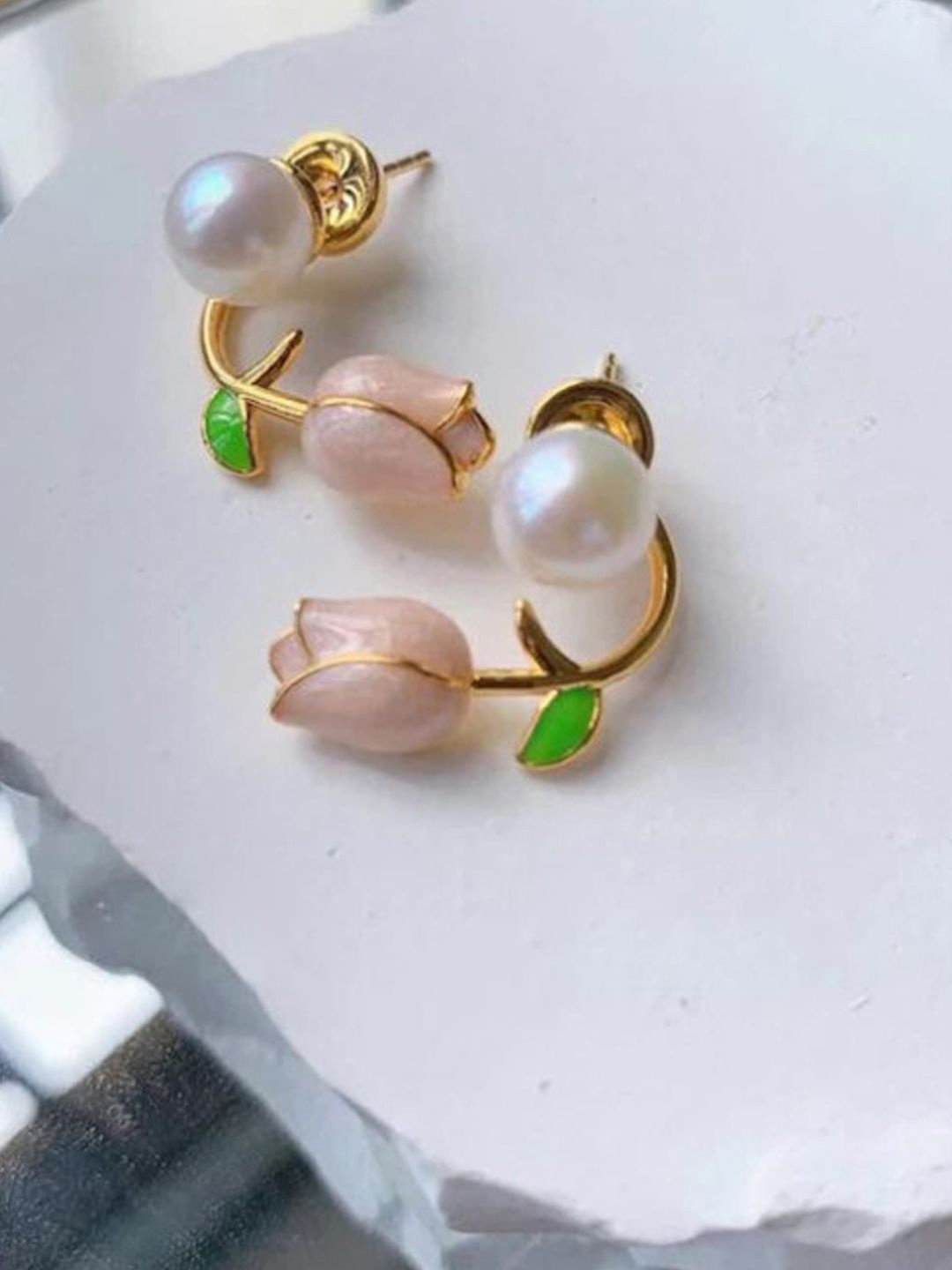 

Xivir Gold-Plated Floral Pearls Studded Earrings