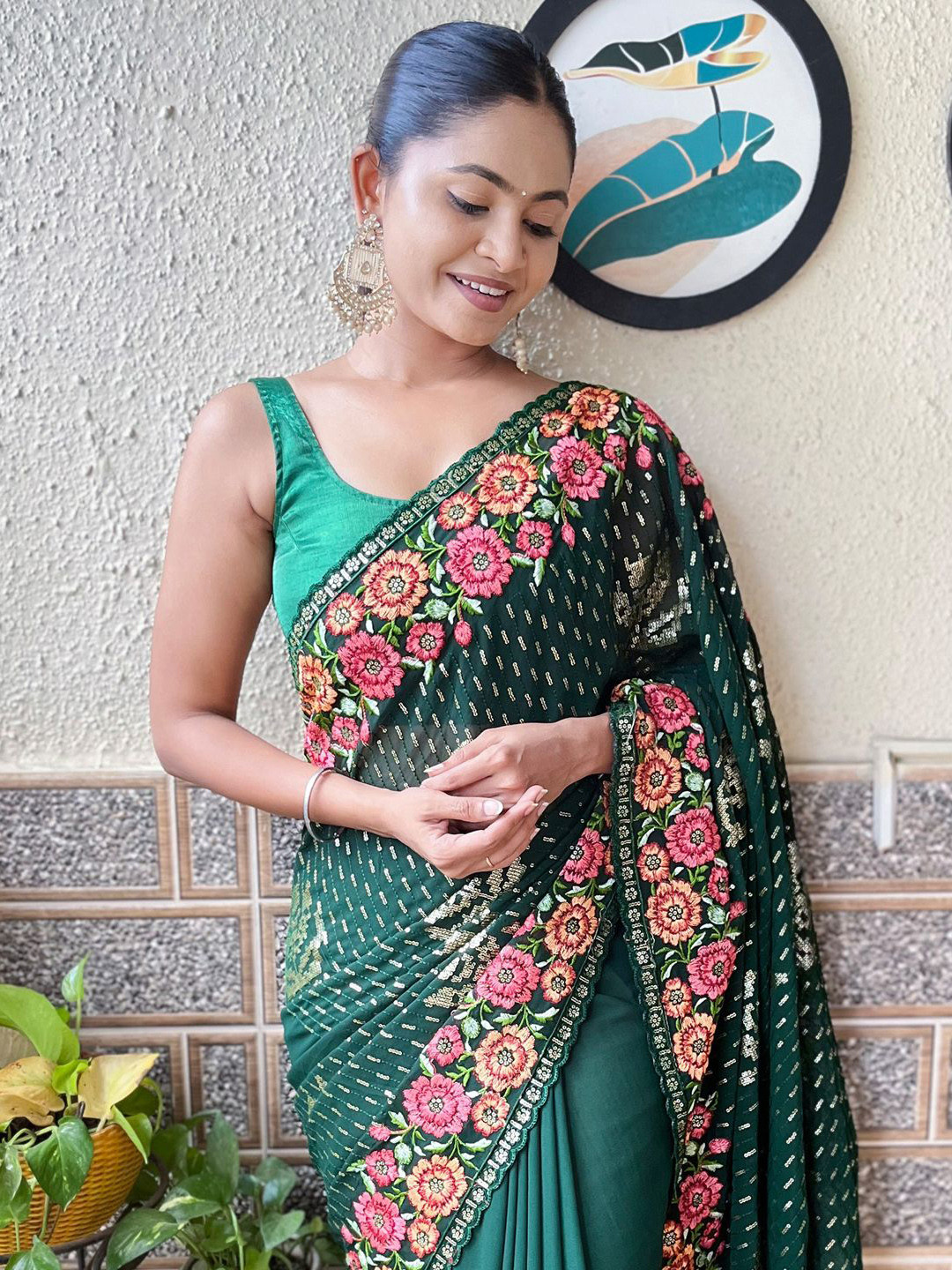 

Mitera Embroidered Sequinned Pure Georgette Saree, Green