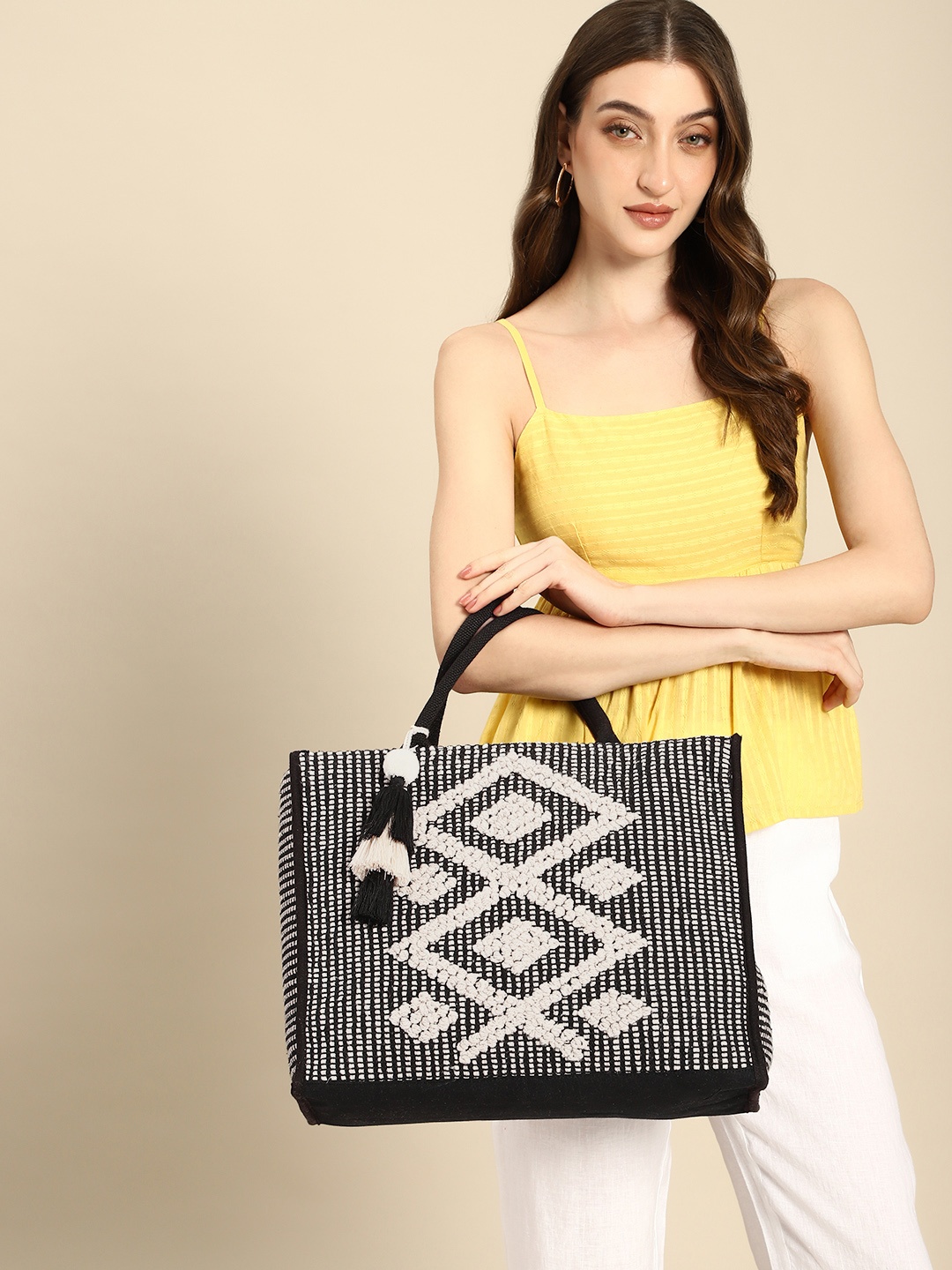

Anouk Geometric Woven Design Structured Tasselled Handheld Bag, Black