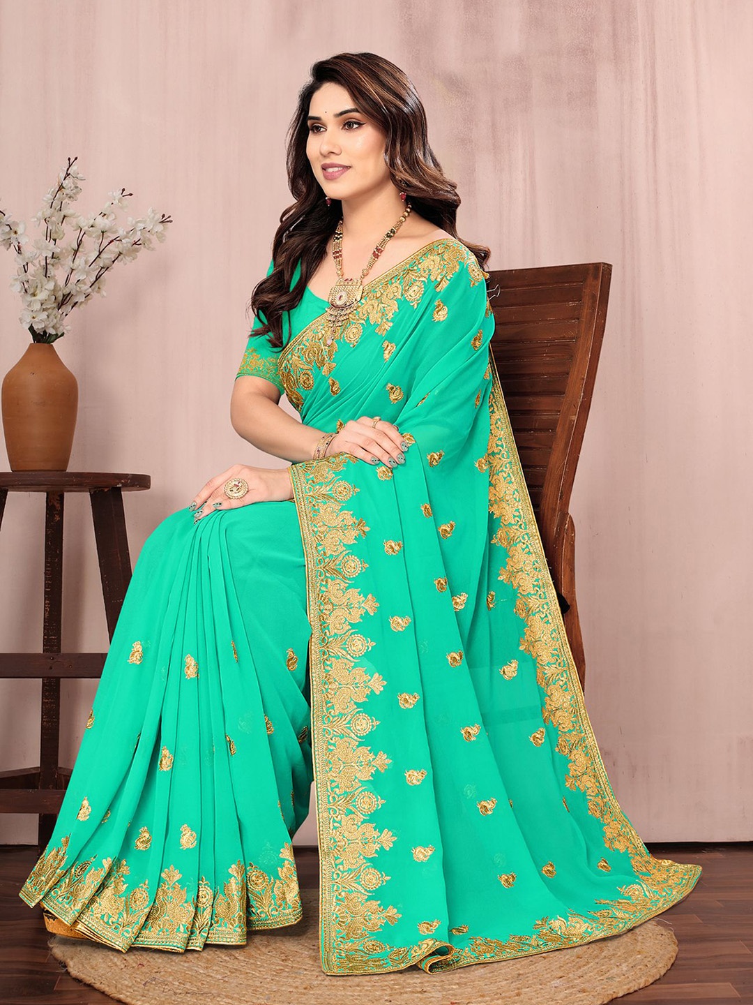

Om Shantam Sarees Ethnic Motifs Embroidered Saree, Turquoise blue