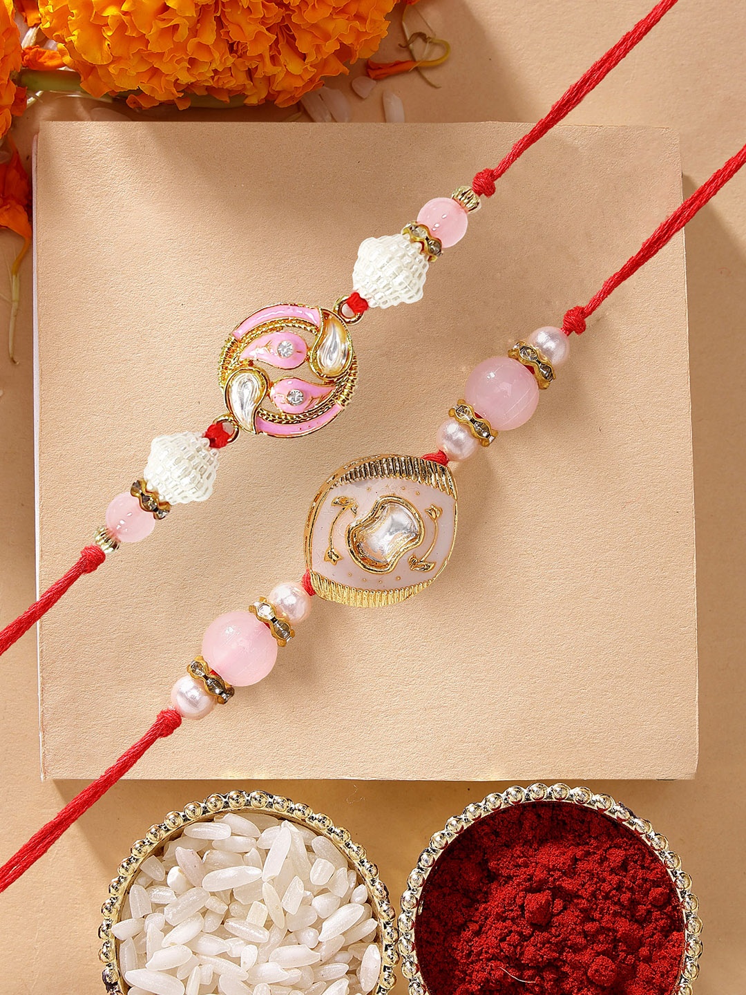 

KARATCART Set of 2 Pink & Peach Kundan Rakhi with Roli & Chawal, Red