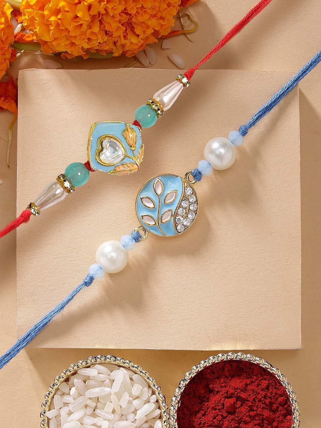 

KARATCART Set of 2 Blue Meena Floral Kundan Rakhi with Roli & Chawal