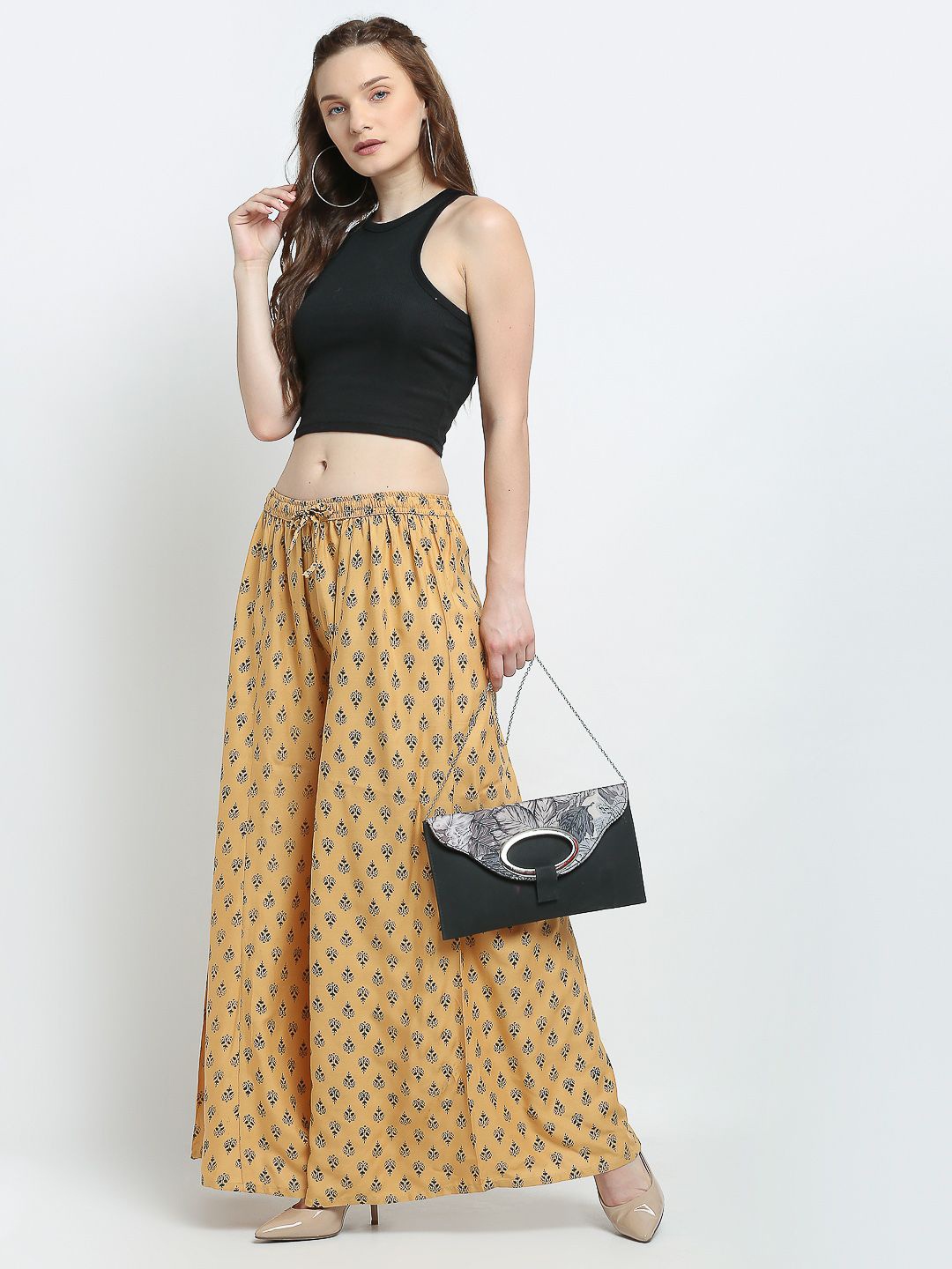 

GRACIT Women Ethnic Motifs Printed Flared Palazzos, Beige
