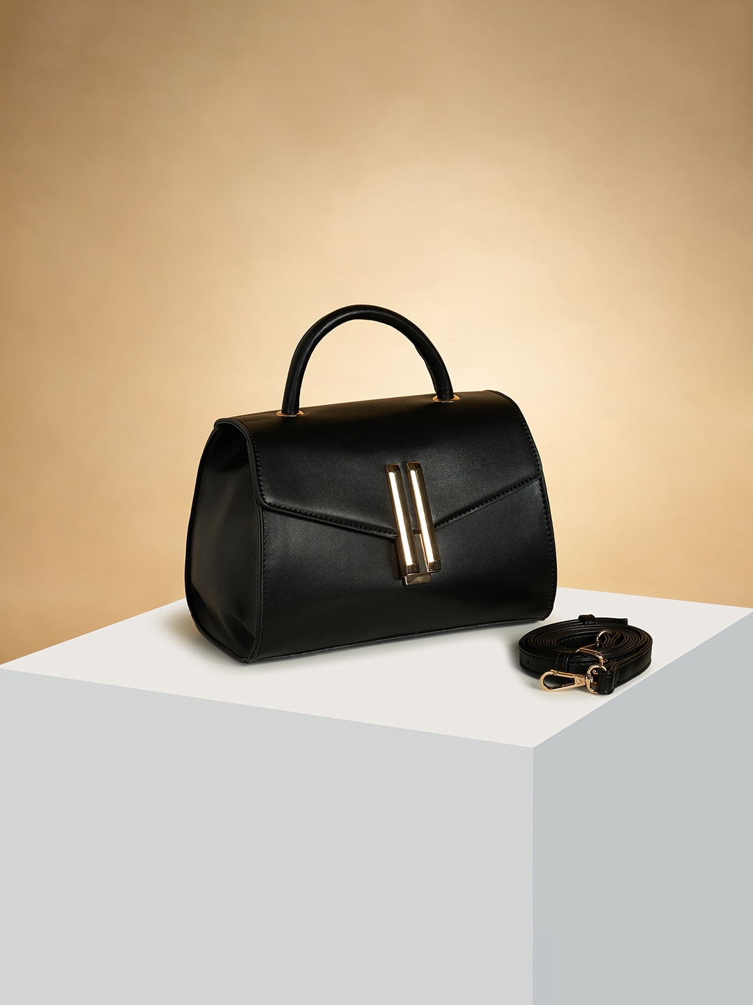 

Forever Glam by Pantaloons PU Structured Handheld Bag with Tasselled, Black