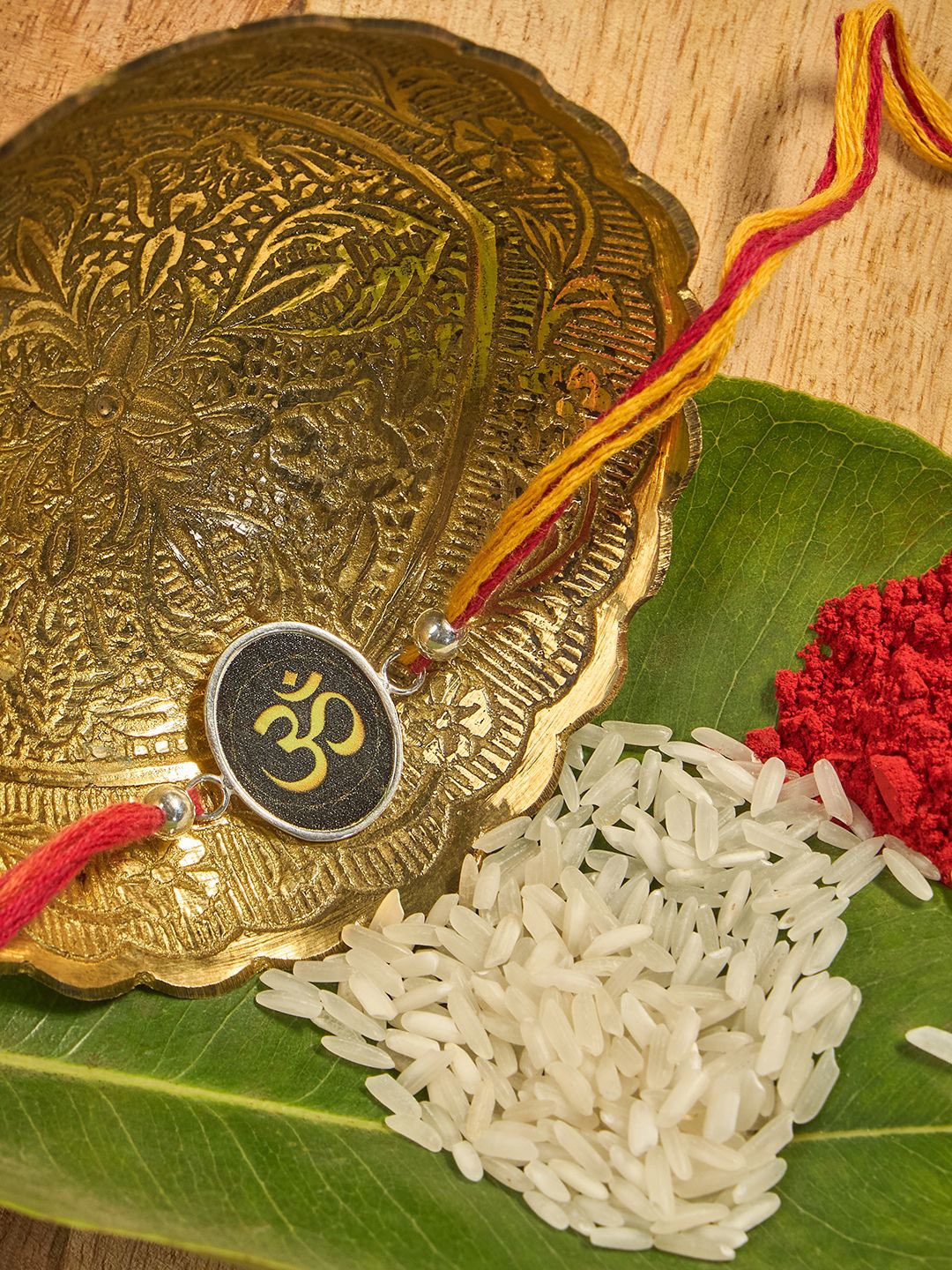 

Anouk 925 Sterling Silver Contemporary Rakhi With Roli Chawal