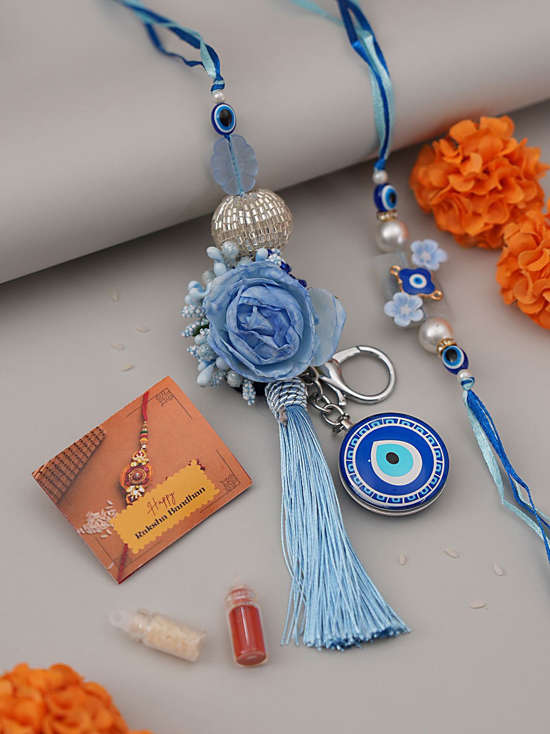 

Saraf RS Jewellery Set Of 2 Evil Pair Thread Rakhis, Blue