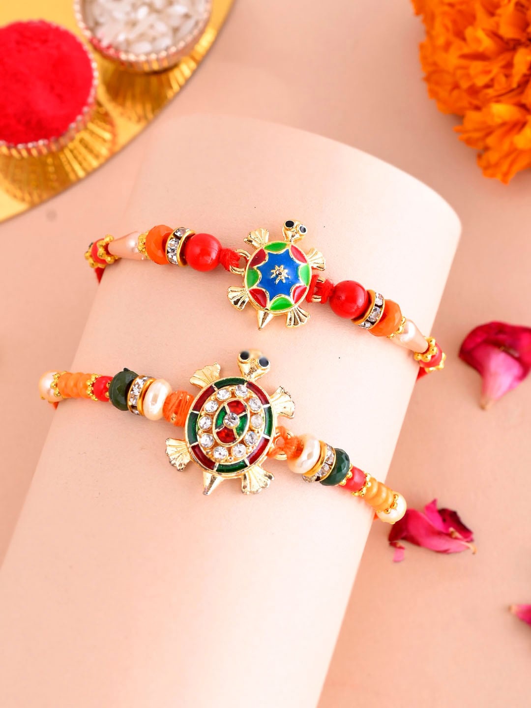 

Aapno Rajasthan Set Of 2 Stone Studded & Beaded Rakhis With Roli Chawal & Greetings Card, Gold