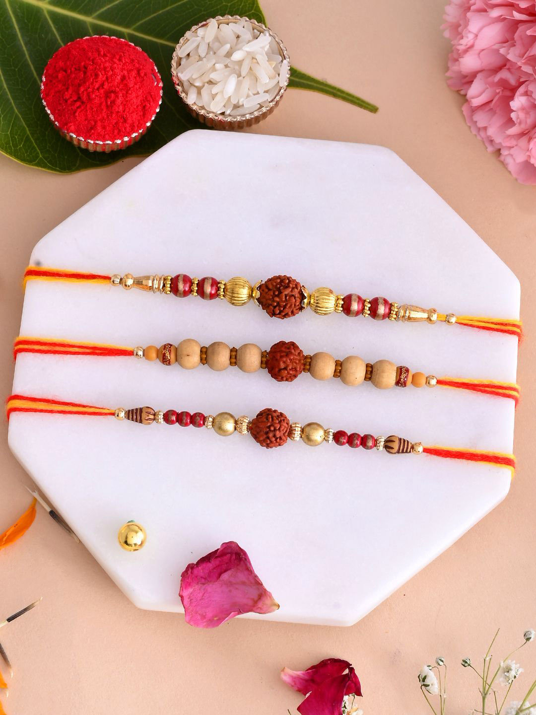 

Aapno Rajasthan Set Of 3 Rudraksh Thread Rakhi With Roli Chawal & Greeting Card, Brown