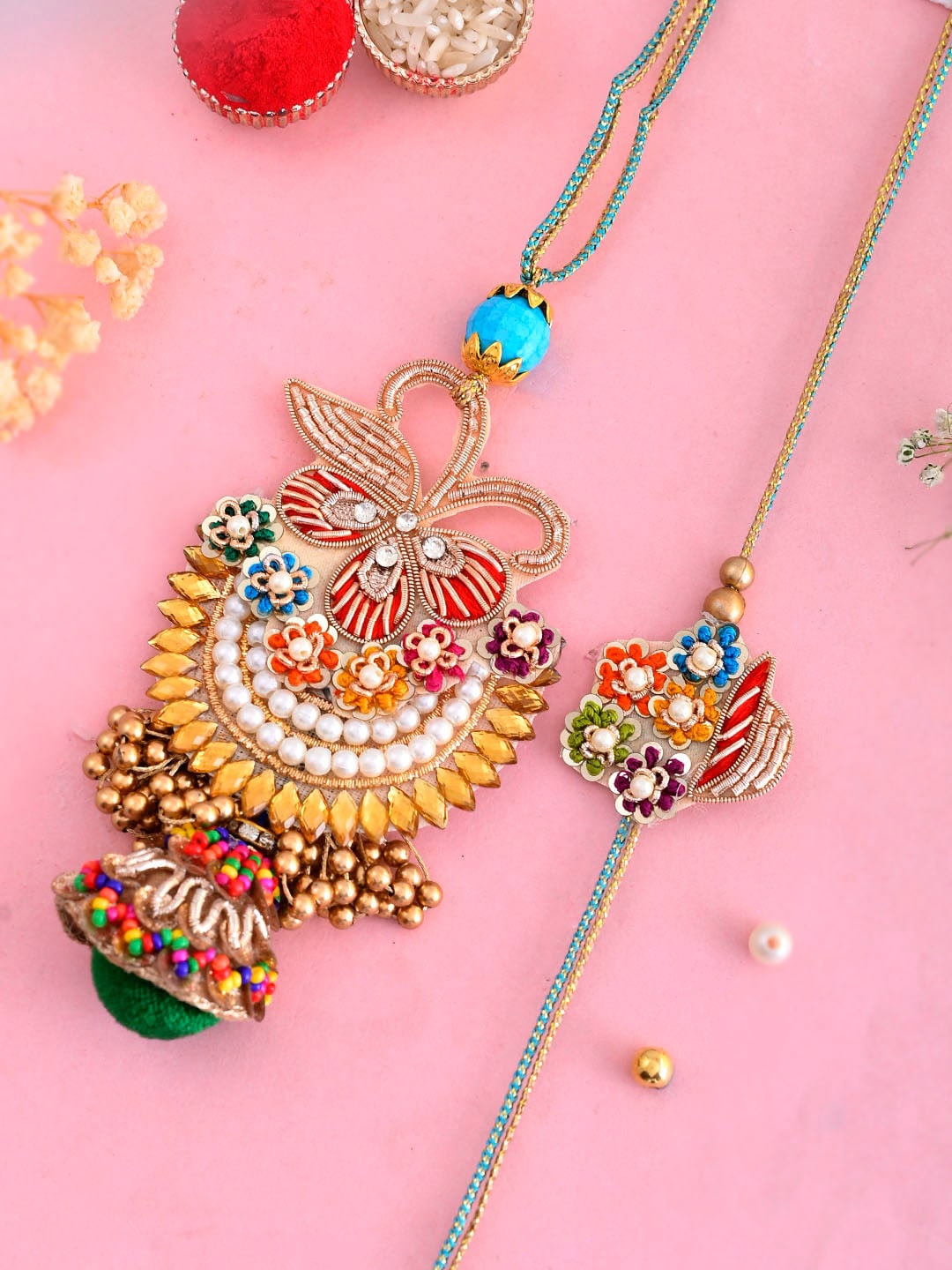 

Aapno Rajasthan Bhaiya Bhabhi Beaded Rakhi with Roli Chawal & Greeting Card, Gold