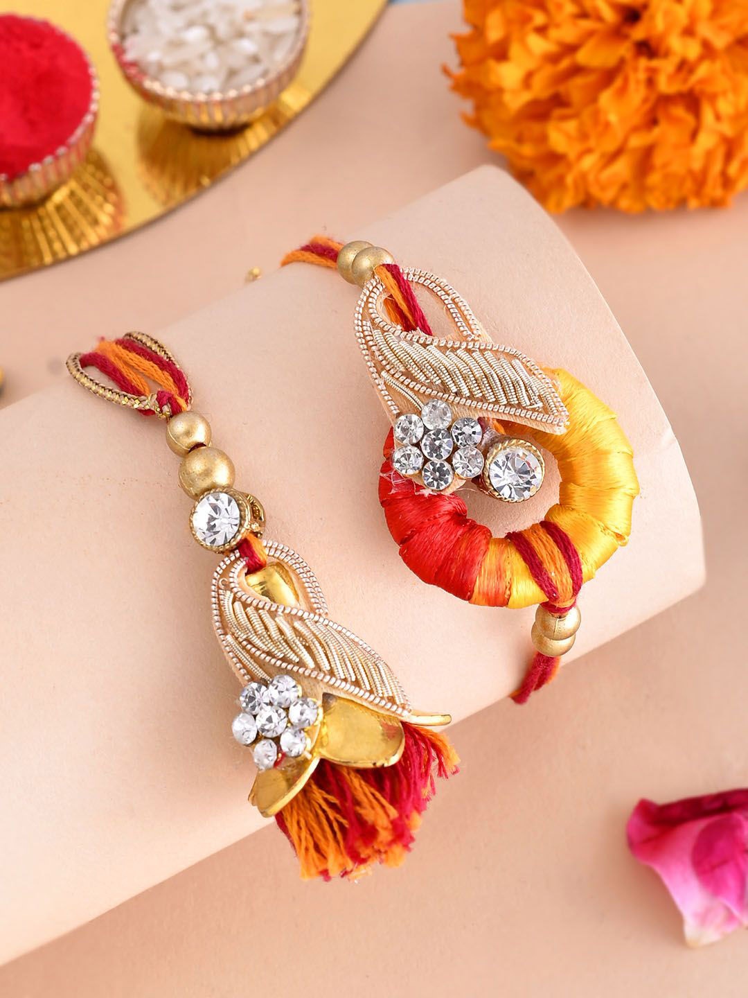 

Aapno Rajasthan Stone Studded & Beaded Bhaiya Bhabhi Rakhi With Roli Chawal, Gold