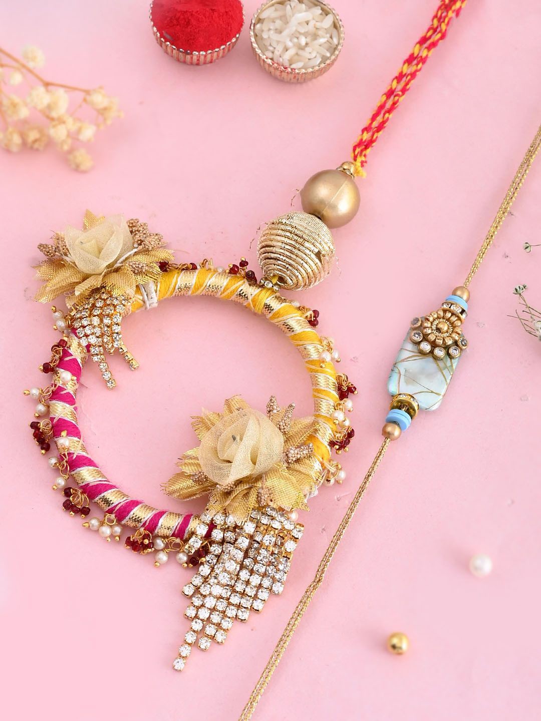 

Aapno Rajasthan Bhaiya Bhabhi Thread Rakhi With Roli Chawal & Greeting Card, Gold