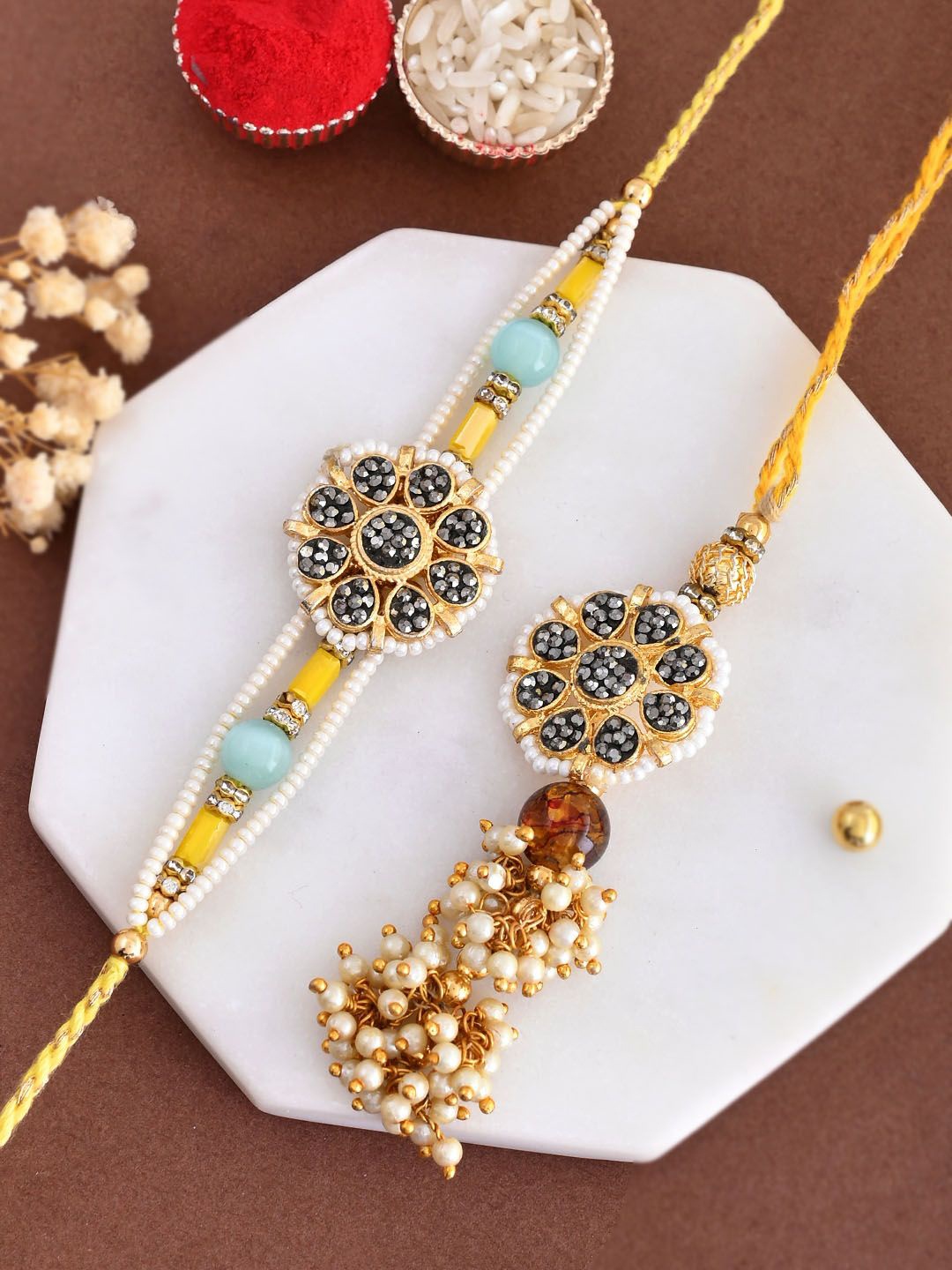 

Aapno Rajasthan Bhaiya Bhabhi Beaded Rakhi with Roli Chawal & Greeting Card, Gold