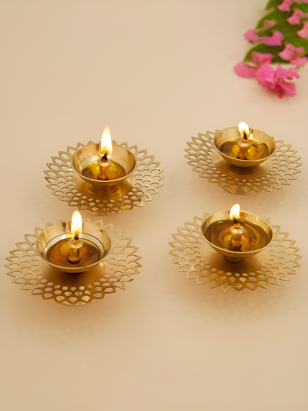 

DecorTwist Gold toned 4 Pieces Brass Diyas Pooja Essentials