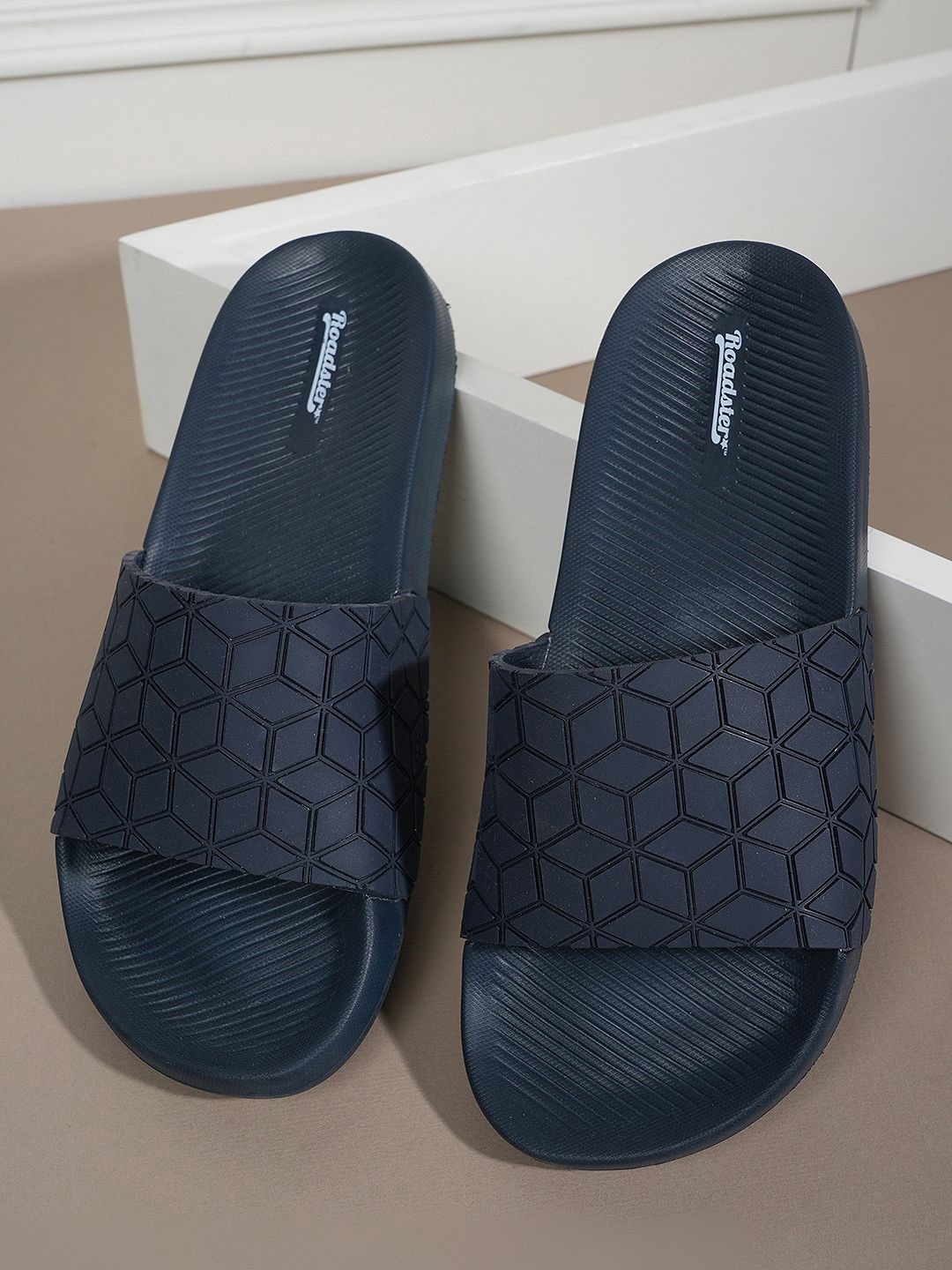 

The Roadster Lifestyle Co. Men Navy Blue Printed Sliders