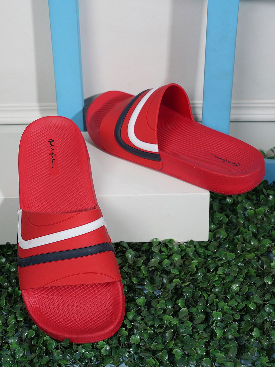 

Mast & Harbour Men Red Printed Rubber Sliders