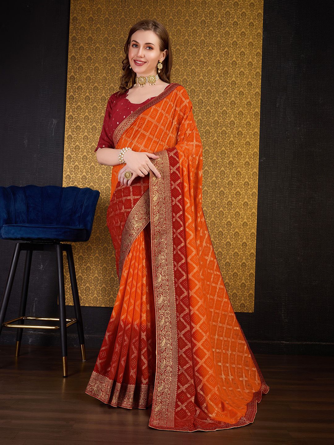 

Ishin Zari woven Ethnic motif Bandhni Printed Saree, Maroon