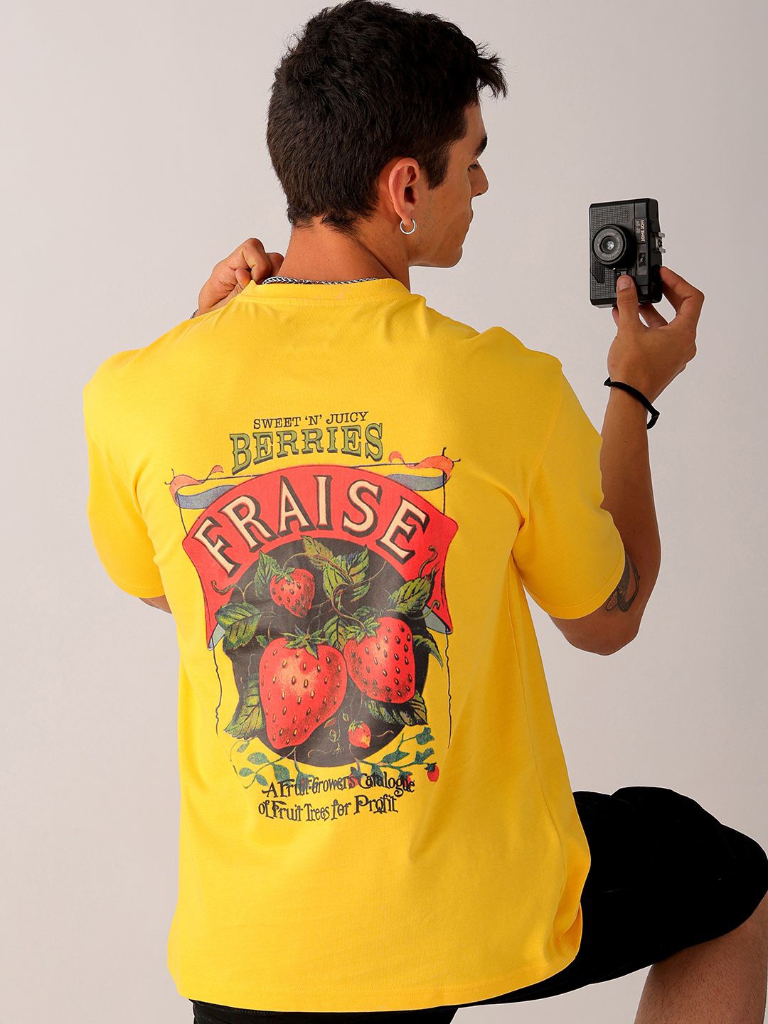 

The Indian Garage Co Men Back Printed Boxy Oversized Round Neck T-shirt, Mustard