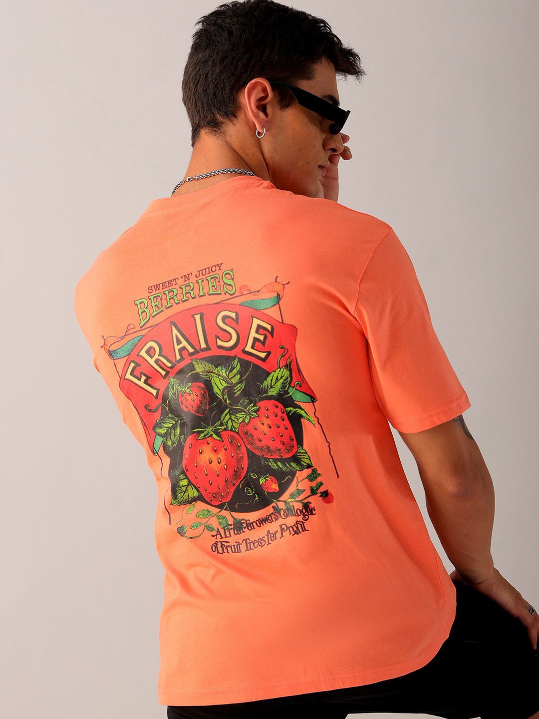 

The Indian Garage Co Men Back Printed Boxy Oversized Round Neck T-shirt, Orange