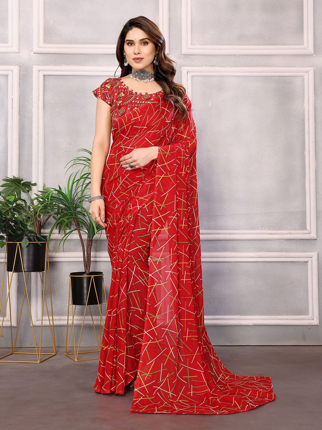 

Moda Rapido Abstract Printed Pure Georgette Saree, Red