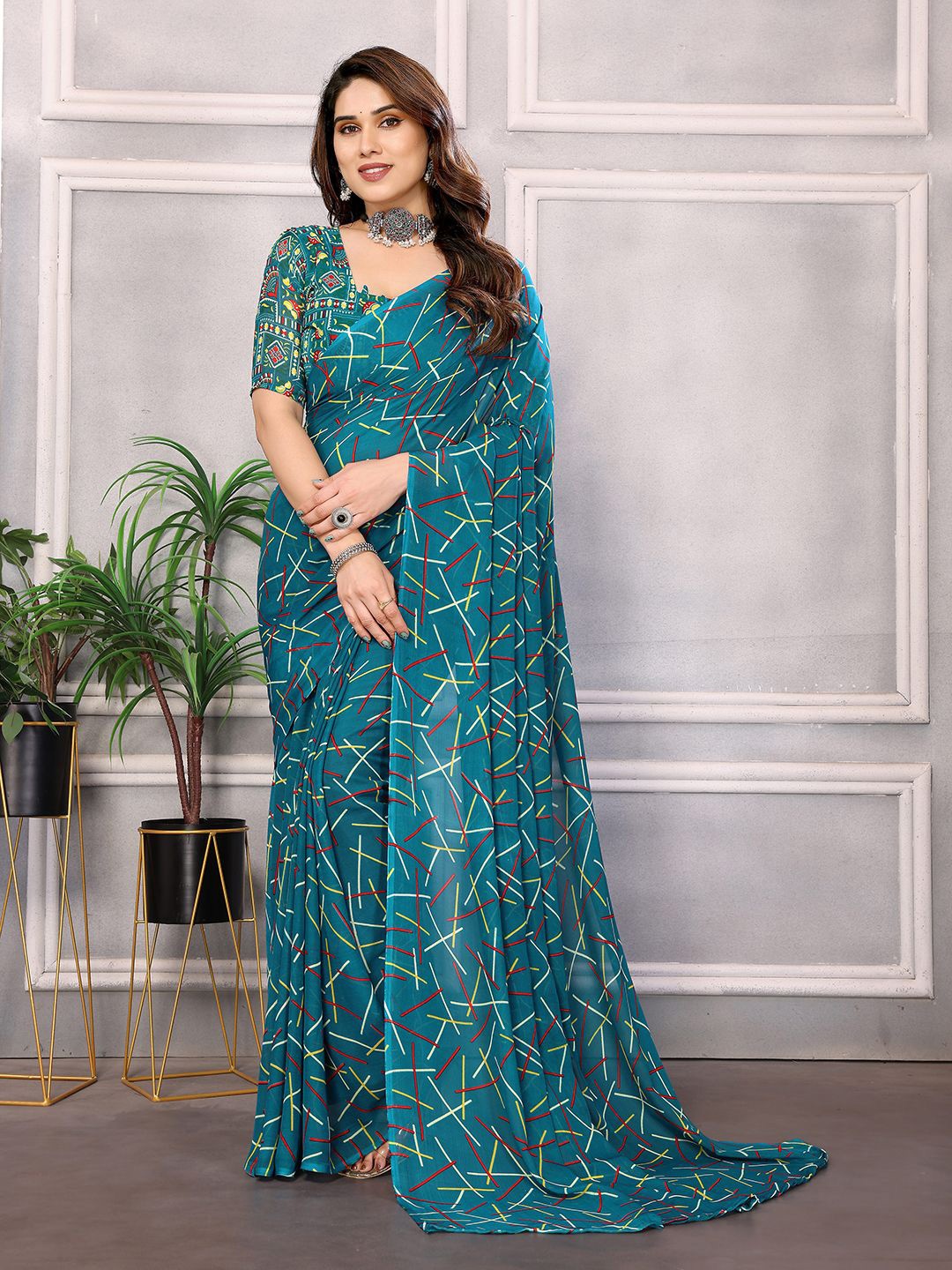 

Moda Rapido Printed Pure Georgette Saree With Blouse Piece, Blue