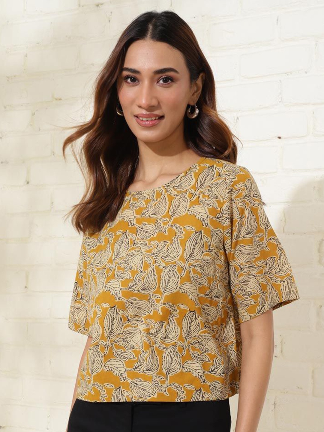 

Fabindia Tropical Printed Round Neck Cotton Crop Top, Mustard