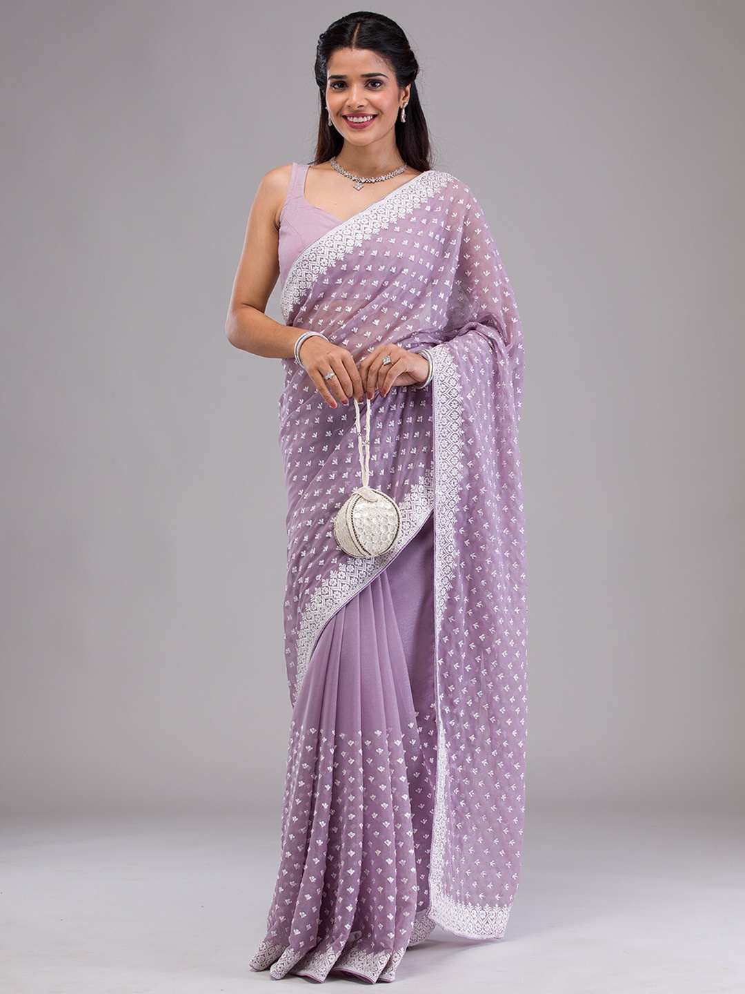 

Koskii Floral Embroidered Pure Georgette Saree, Purple