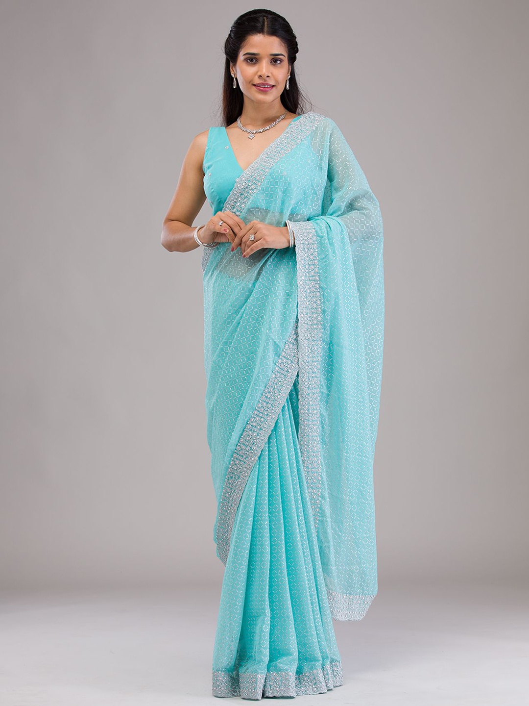 

Koskii Embellished Beads and Stones Pure Georgette Saree, Blue