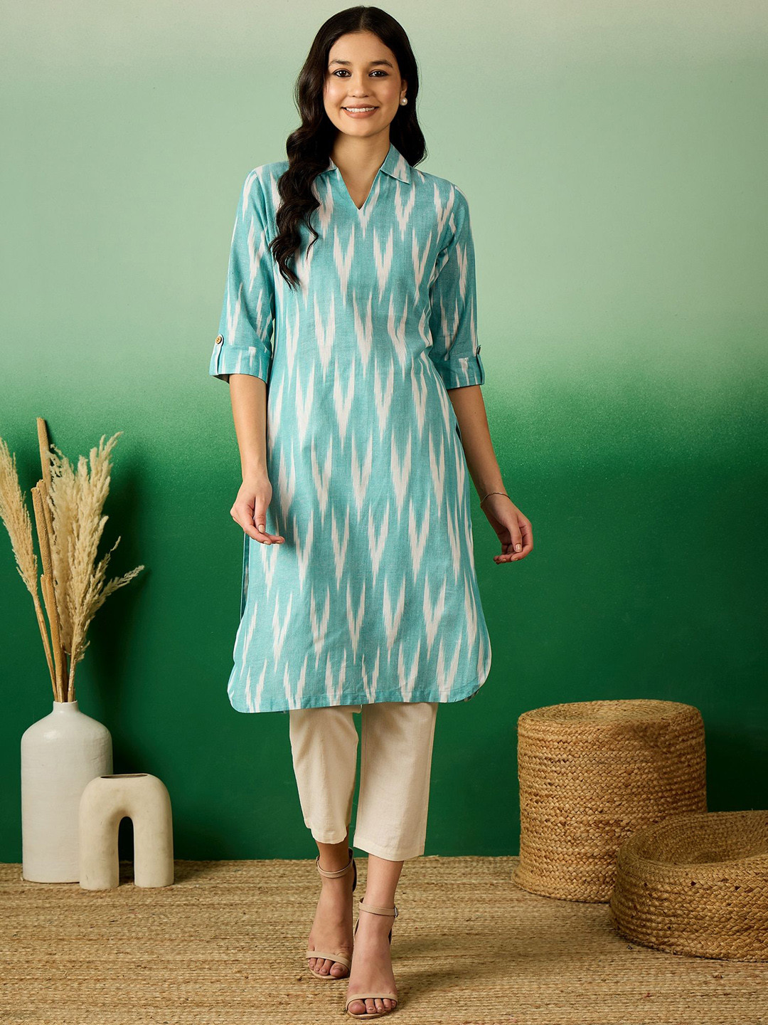 

Sangria Blue Ikkat Printed Roll-Up Sleeves Shirt Collar Pure Cotton Straight Kurtas